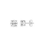 Four metallic brake pads on a white background