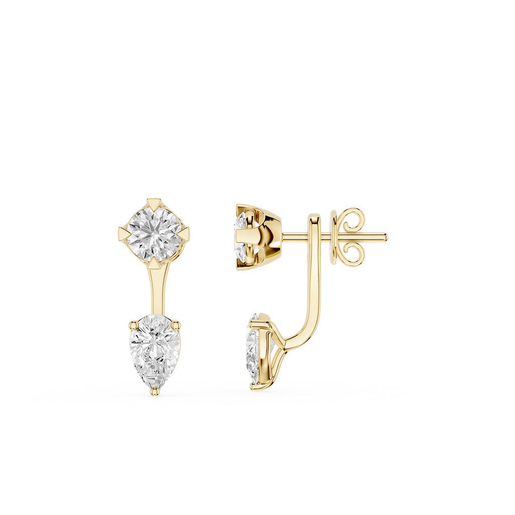 Gold earrings with clear gemstones on a white background