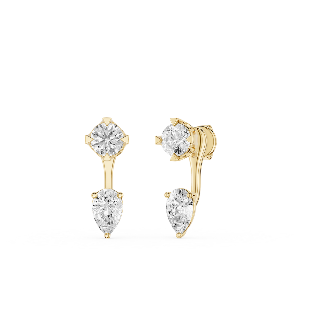 Gold earrings with clear gemstones on a white background