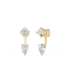 Gold earrings with clear gemstones on a white background