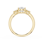 Gold ring with diamond accents on a white background