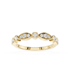 Gold ring with embedded diamonds on a white background