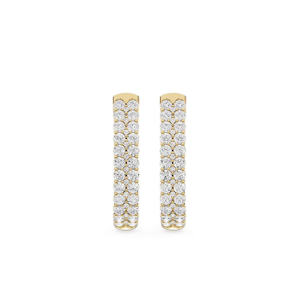 Pair of gold hoop earrings with diamond accents on a white background