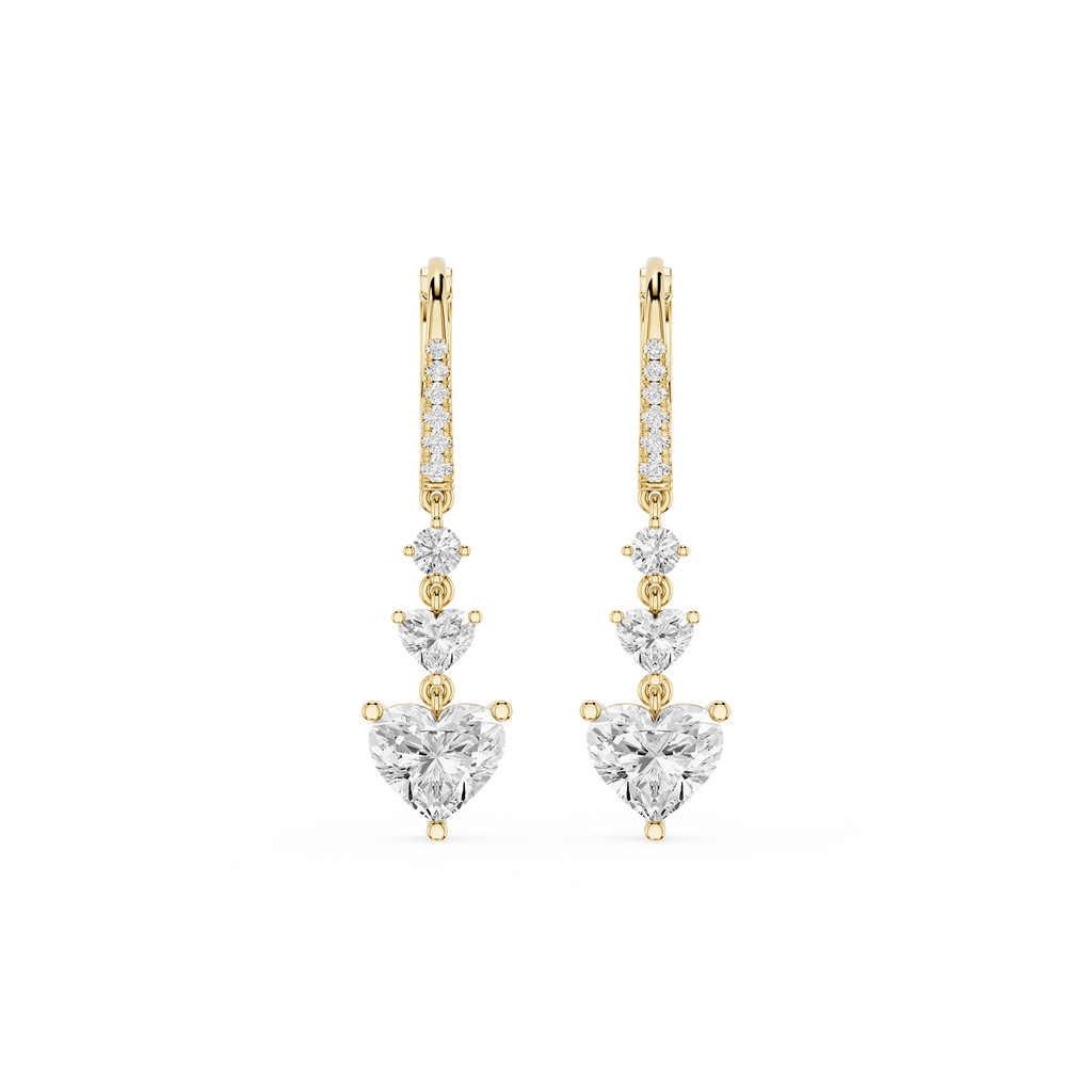 Gold and diamond earrings on a white background