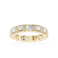 A yellow gold eternity ring featuring a row of rectangular baguette-cut clear gemstones, shown on a clean white background.