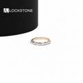 Rose gold lab grown diamond wedding band featuring alternating baguette and round cut diamonds on a slim band