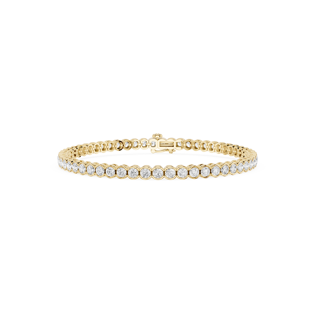Gold bracelet with clear stones on a white background