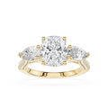 Gold ring with three diamonds on a white background