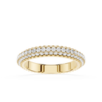 Gold ring with diamond accents on a white background