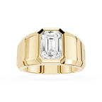 Gold ring with a large diamond on a white background