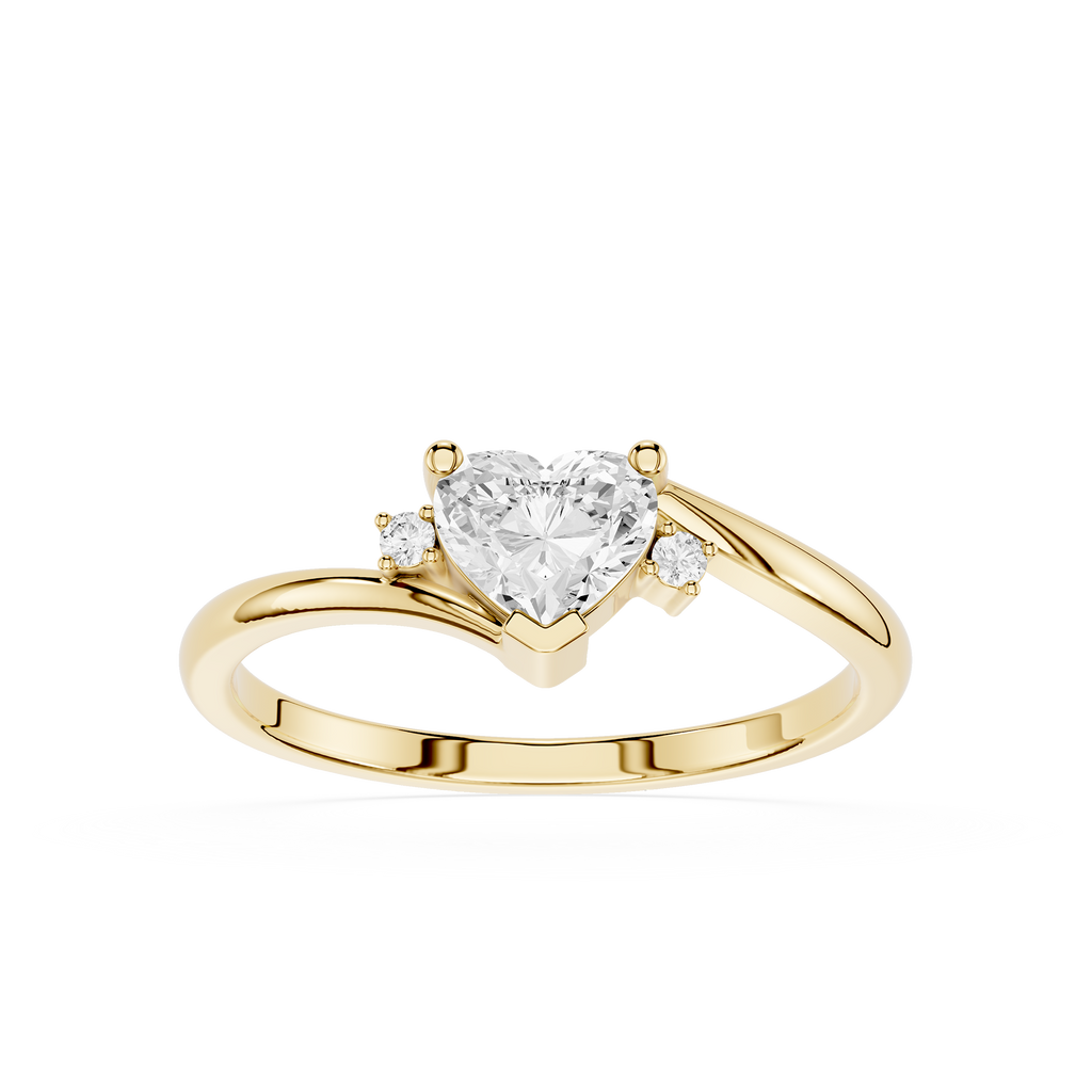 Gold ring with a heart-shaped diamond on a white background