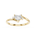 Gold ring with a heart-shaped diamond on a white background