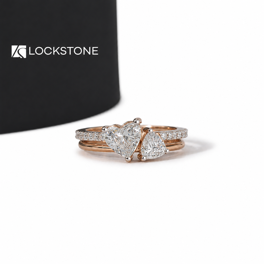 Rose gold heart cut lab grown diamond Toi et Moi bridal ring set with two prong set hearts and a pavé diamond wedding band