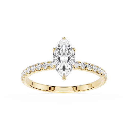 Gold ring with a pear-shaped diamond and smaller diamonds on a white background