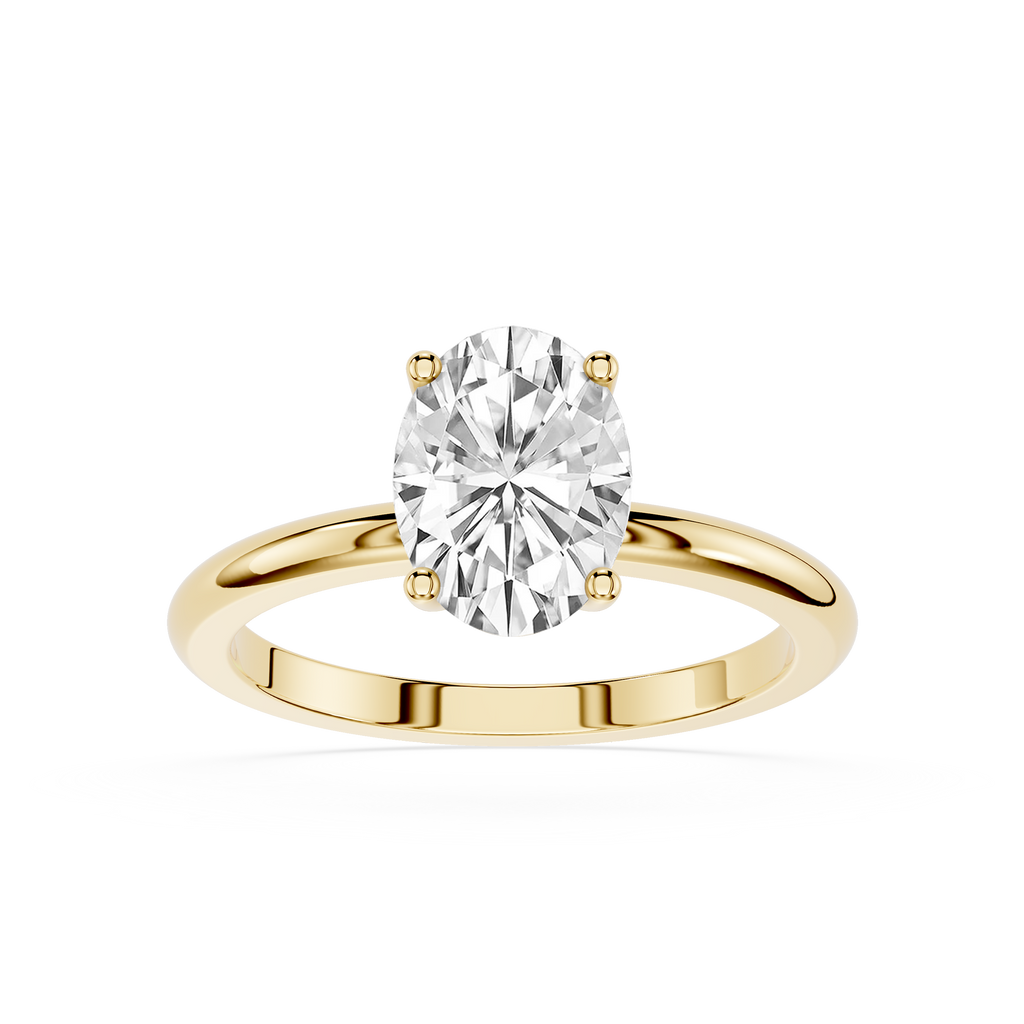 Gold ring with a large diamond on a white background