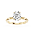 Gold ring with a large diamond on a white background