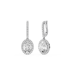Pair of silver earrings with clear gemstones on a white background
