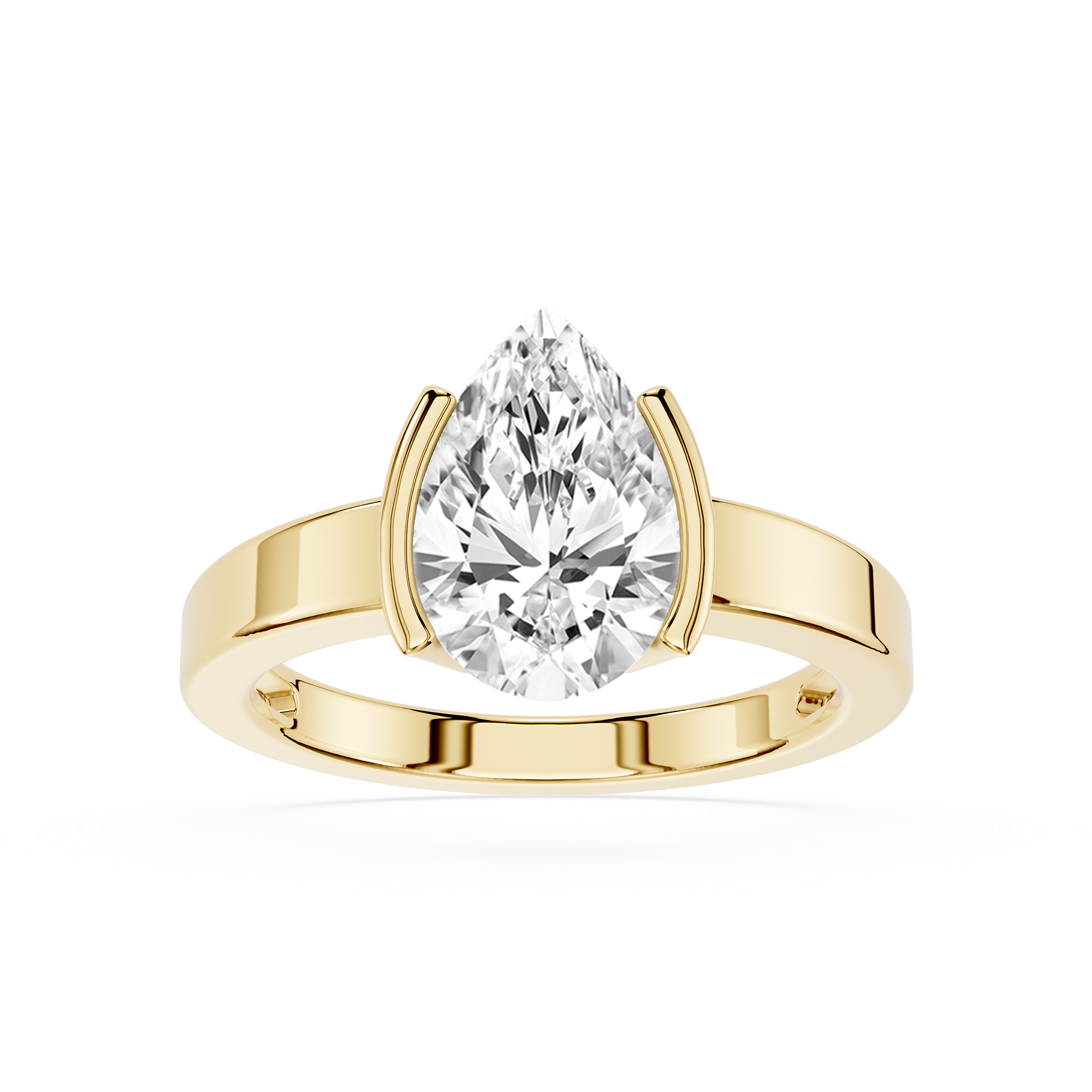 Gold ring with a pear-shaped diamond on a white background