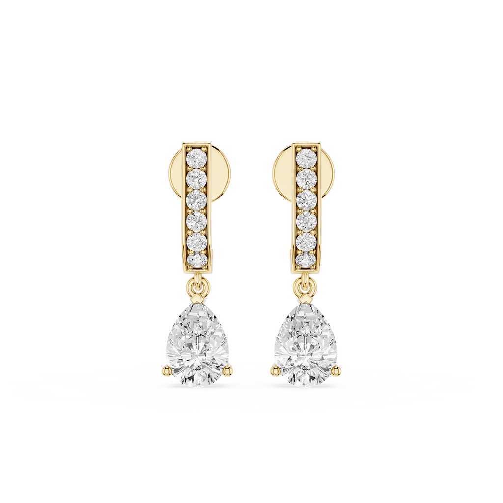 Gold and diamond earrings on a white background