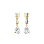 Gold and diamond earrings on a white background