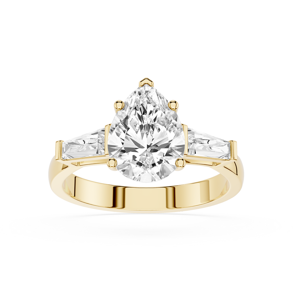 Gold ring with a large pear-shaped diamond on a white background