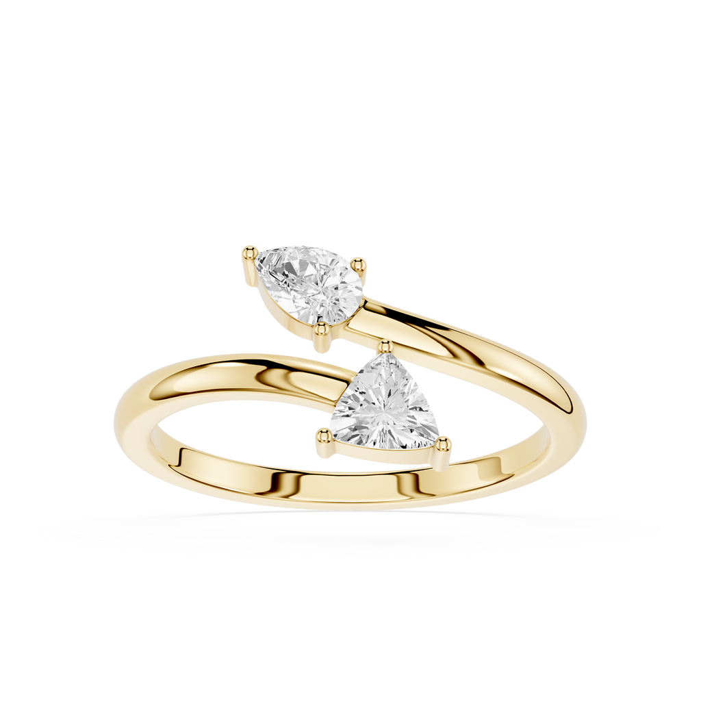 A yellow gold ring featuring two triangular-cut clear gemstones in a split-band design, set against a plain white background.