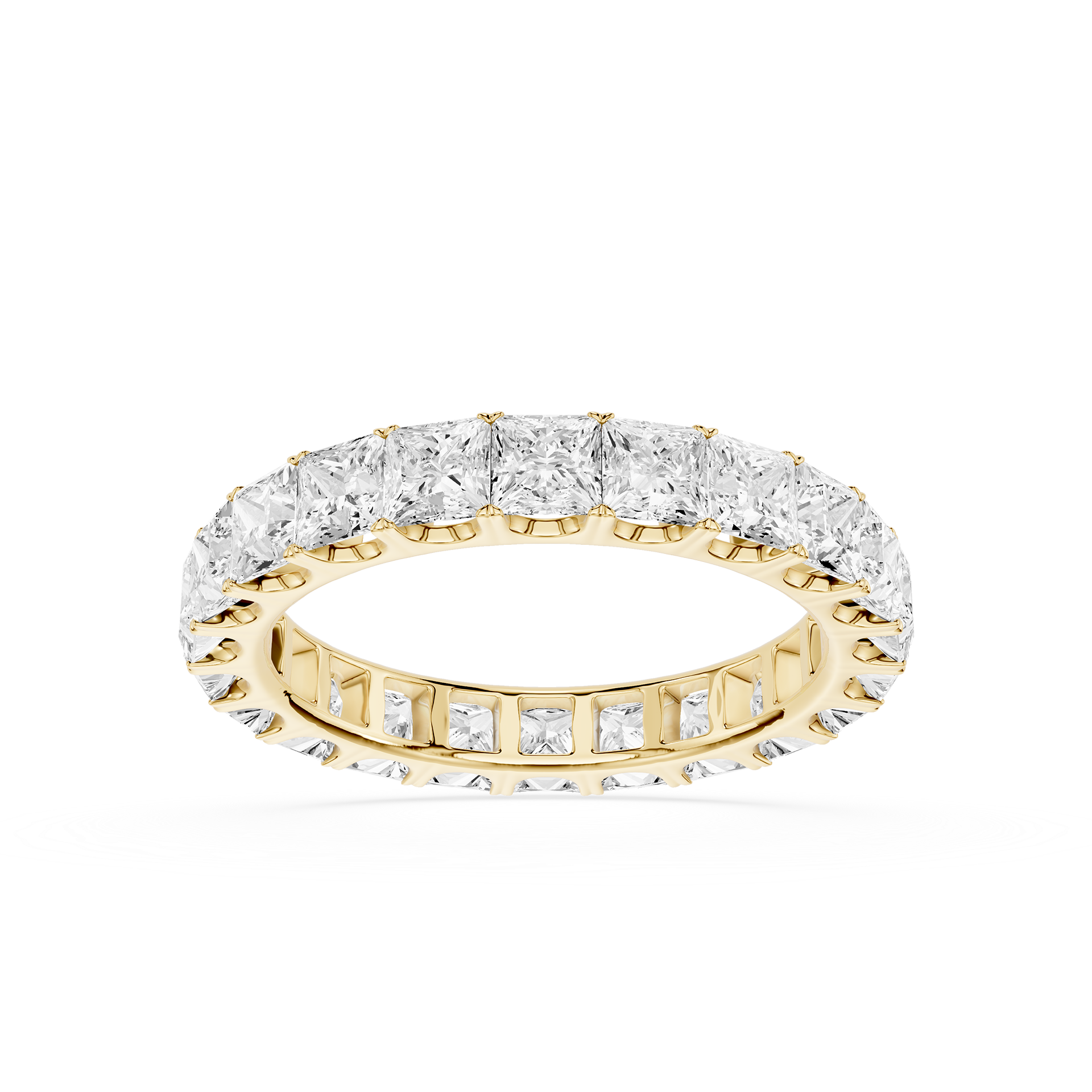 A yellow gold eternity ring set with round brilliant-cut diamonds, shown on a clean white background.
