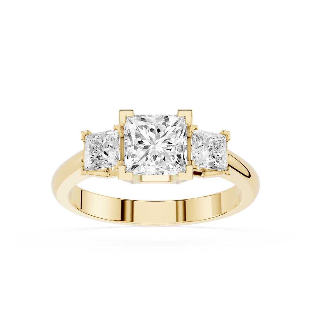 Gold ring with three princess-cut diamonds on a white background