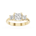 Gold ring with three princess-cut diamonds on a white background
