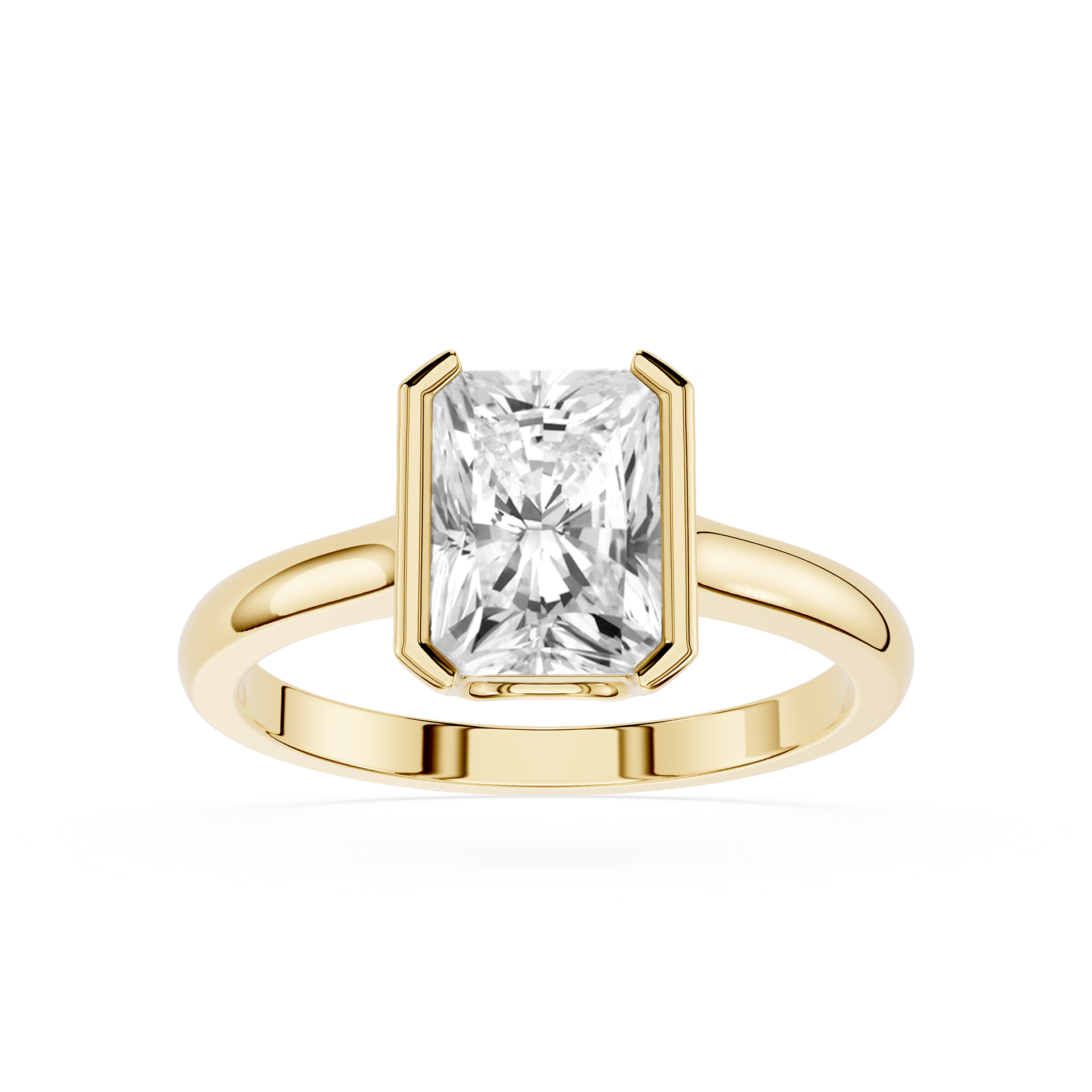 Gold ring with a large rectangular diamond on a white background
