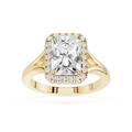Gold ring with a large diamond and smaller diamonds around on a white background