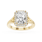 Gold ring with a large diamond and smaller diamonds around on a white background
