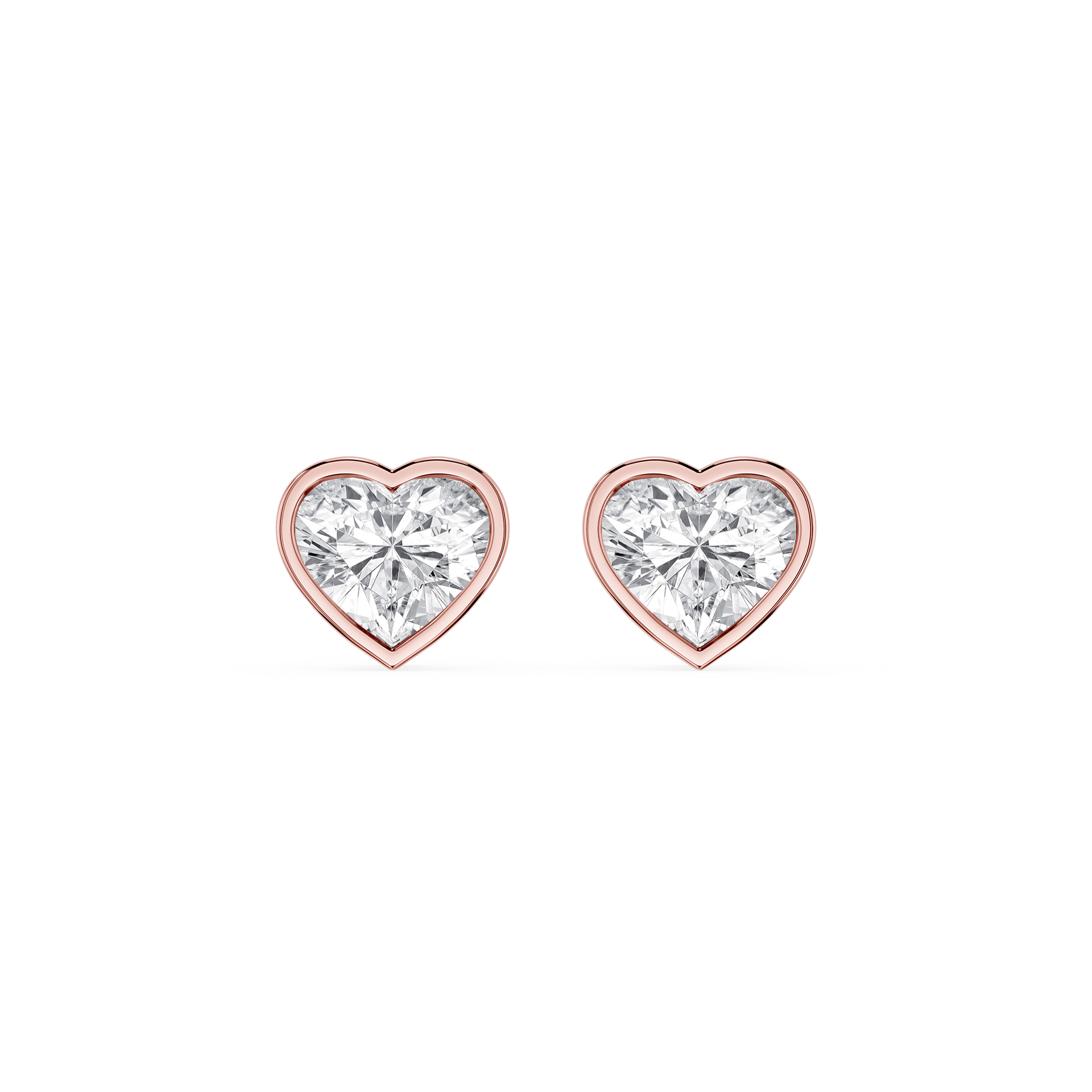 Heart-shaped diamond earrings with rose gold setting on a white background