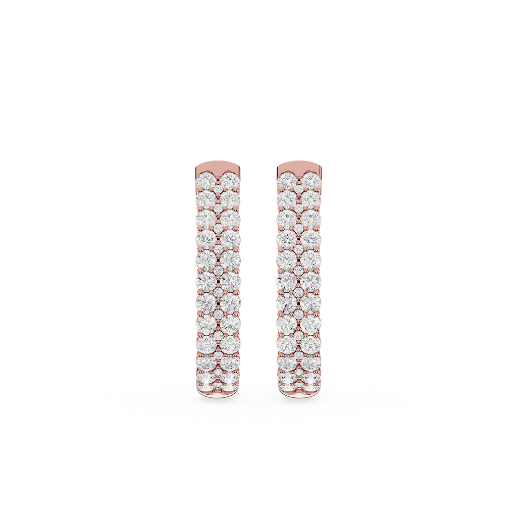 Rose gold earrings with diamond accents on a white background