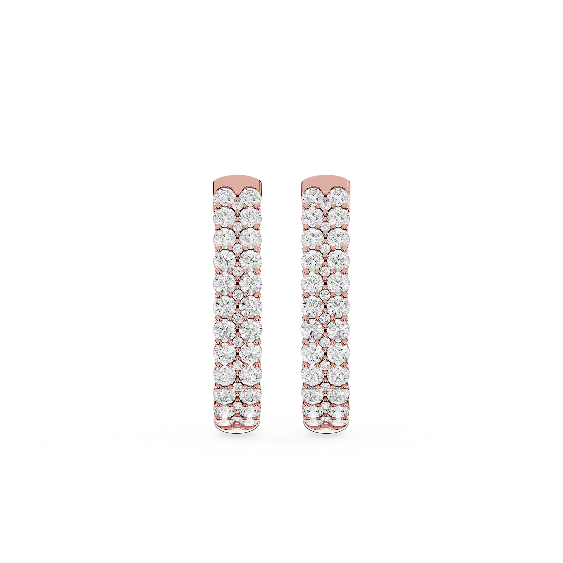 Rose gold earrings with diamond accents on a white background