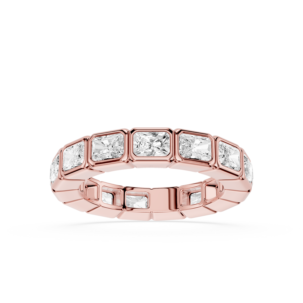 A rose gold eternity ring featuring a row of rectangular baguette-cut clear gemstones in a polished setting, shown on a clean white background.