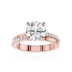 Rose gold ring with a large diamond and smaller diamonds on the band against a white background