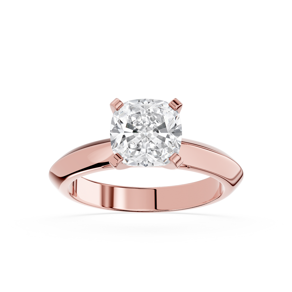 Rose gold ring with a large diamond on a white background