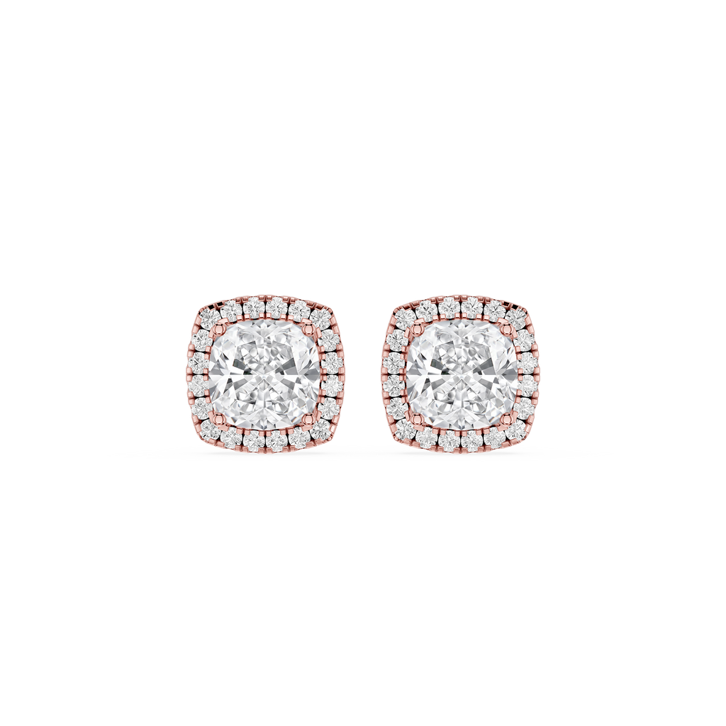 Pair of diamond stud earrings with rose gold accents on a white background