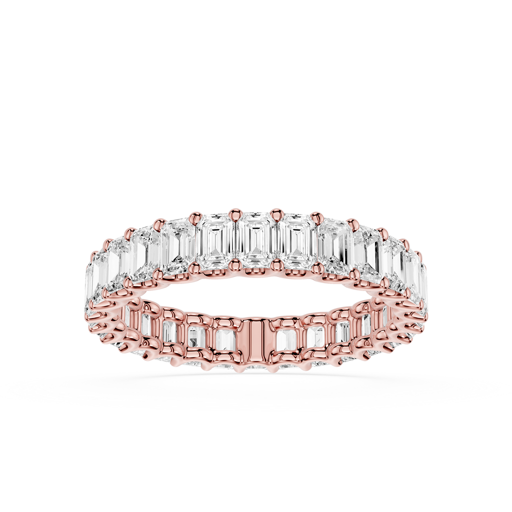 A rose gold eternity ring set with baguette-cut clear stones, shown on a clean white background.