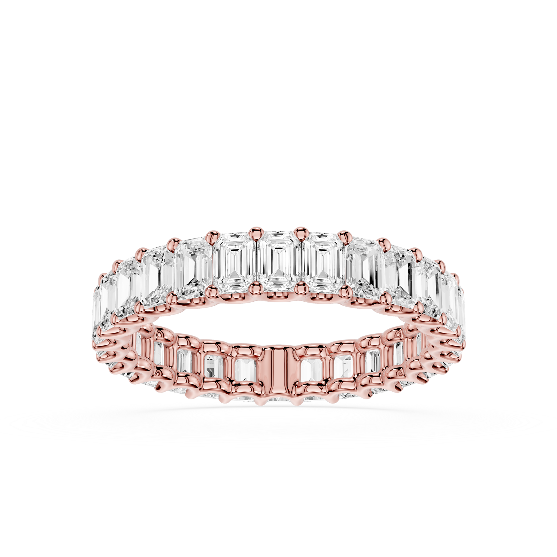 A rose gold eternity ring set with baguette-cut clear stones, shown on a clean white background.