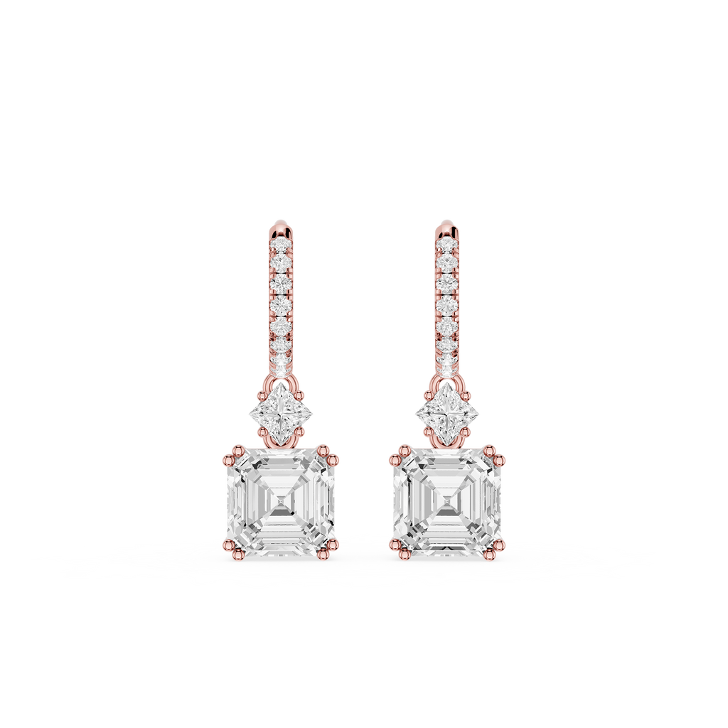 Rose gold and clear crystal earrings on a white background