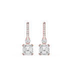 Rose gold and clear crystal earrings on a white background