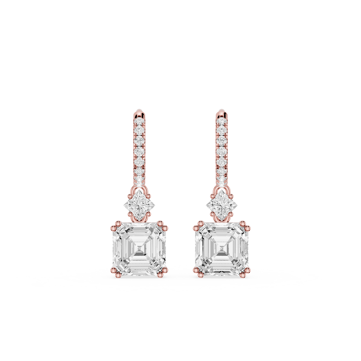 Rose gold and clear crystal earrings on a white background