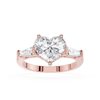 Rose gold ring with a heart-shaped diamond on a white background