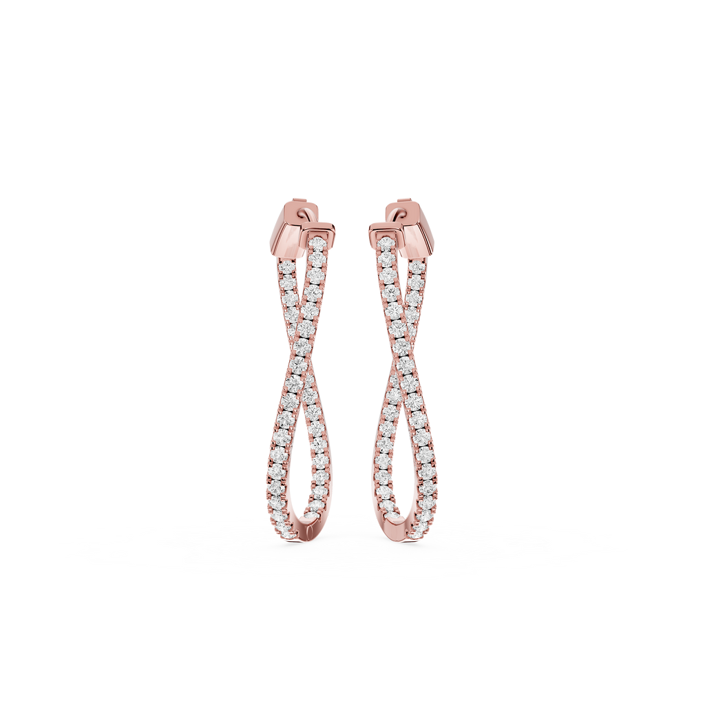 Rose gold earrings with clear gemstones on a white background