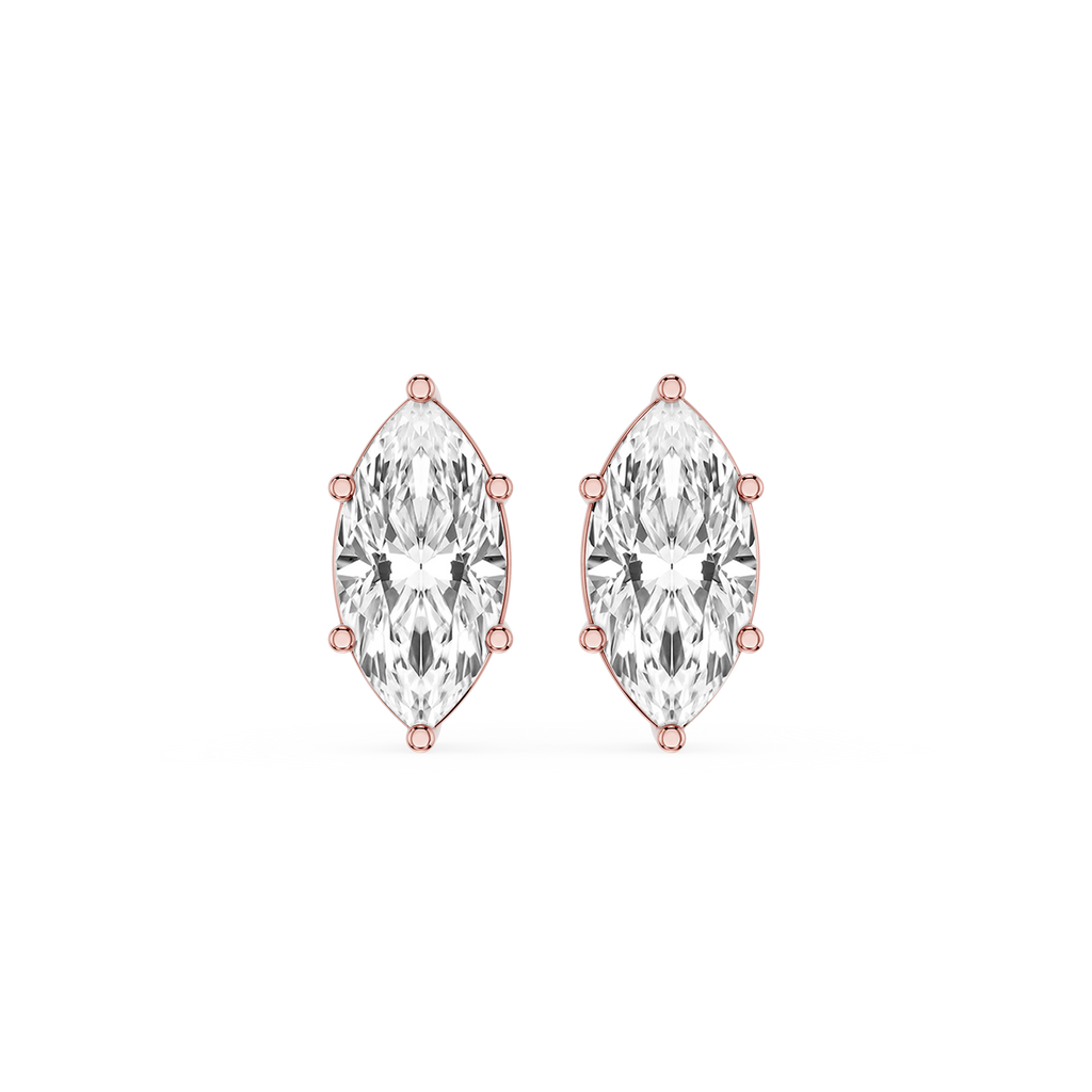 Pair of marquise-shaped diamond earrings with rose gold prongs on a white background