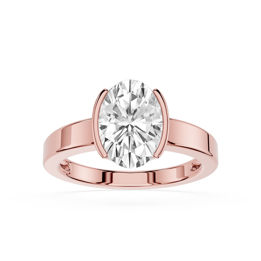 Rose gold ring with a large diamond on a white background