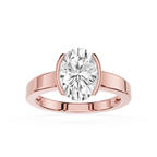 Rose gold ring with a large diamond on a white background