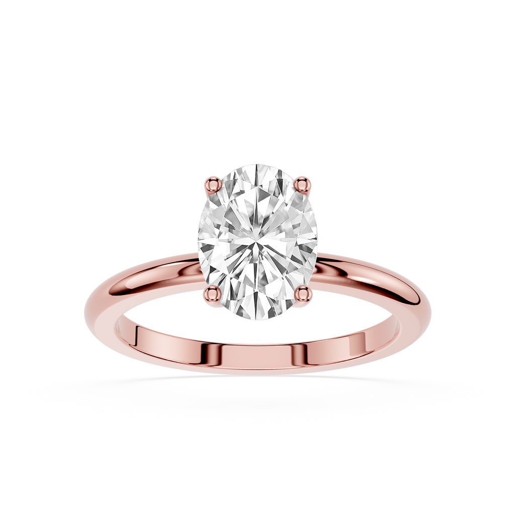 Rose gold ring with a large diamond on a white background